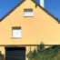 Façade rénovée et isolée par l'extérieur au-dessus du garage après travaux ITE à Sassey, Évreux